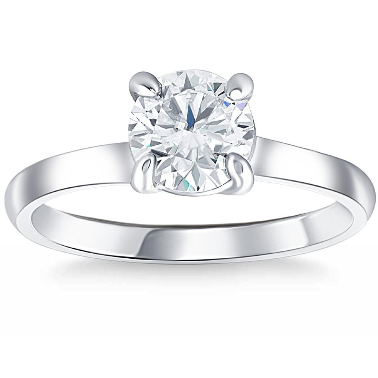 single round cut diamond ring set in sterling silver