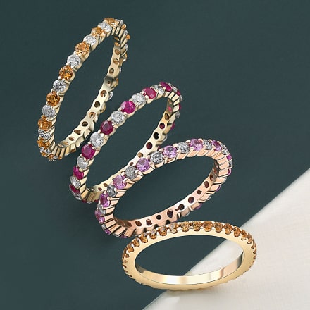 four gemstone stacking rings