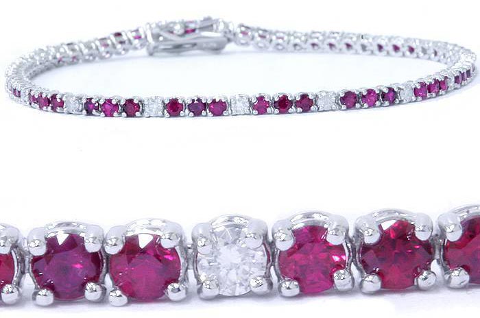 silver diamond tennis bracelet with pink gemstones