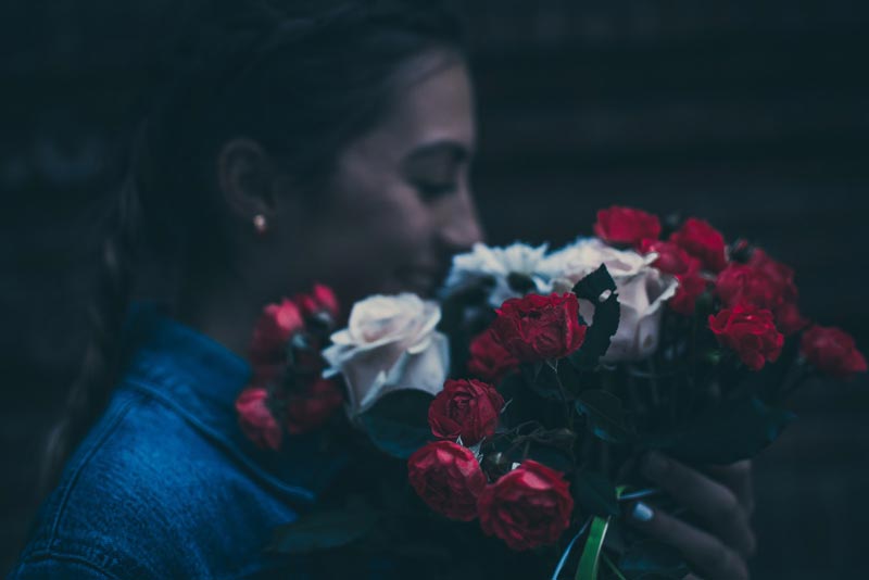 woman holding roses